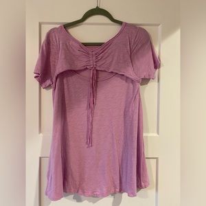 Anthropologie short sleeve with design on the back